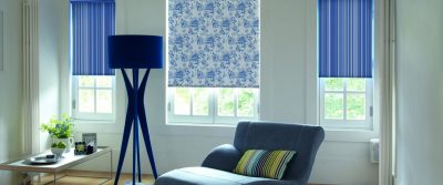 living room with patterned roller blinds