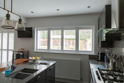 white shutters in kitchen